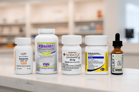 Five veterinary pharmaceutical products lined up side-by-side